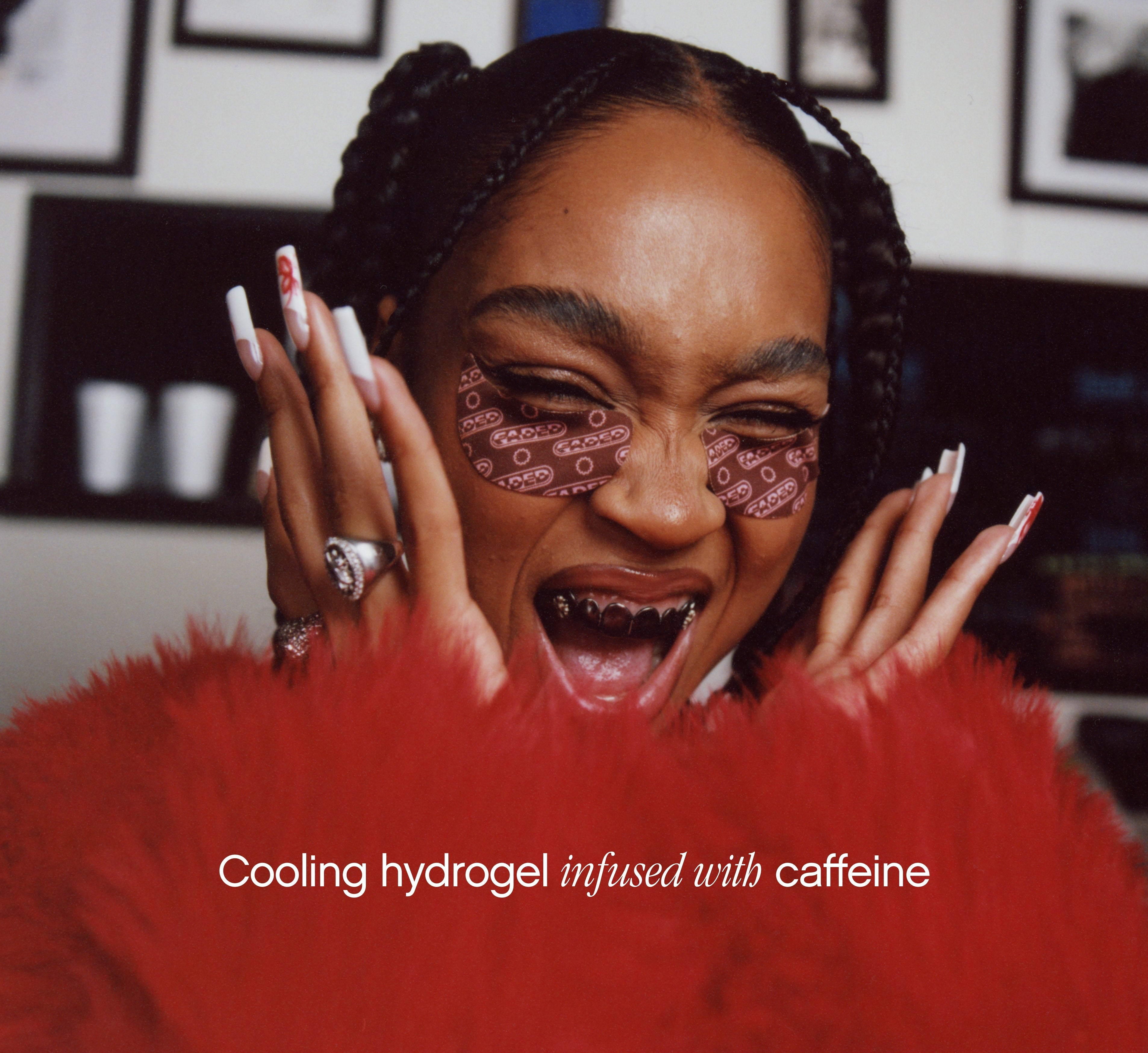 Brightening under eye patches from Topicals Faded worn by a smiling woman with box braids, highlighting the cooling caffeine-infused hydrogel formula.